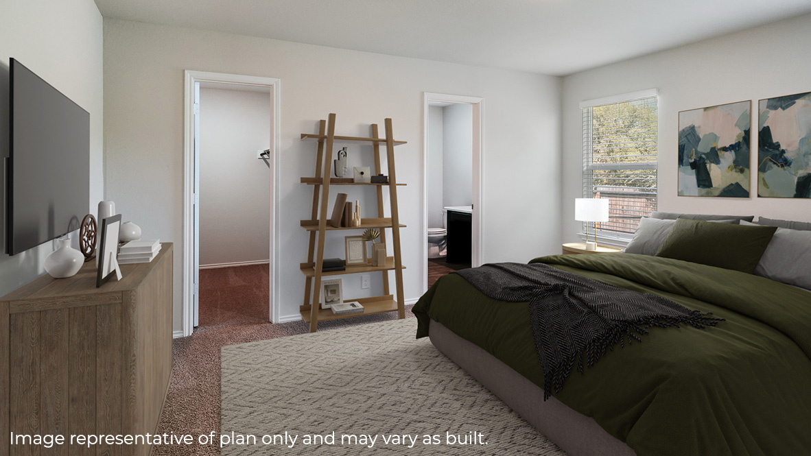 Spacious primary bedroom with ensuite bathroom and windows providing plenty of light.