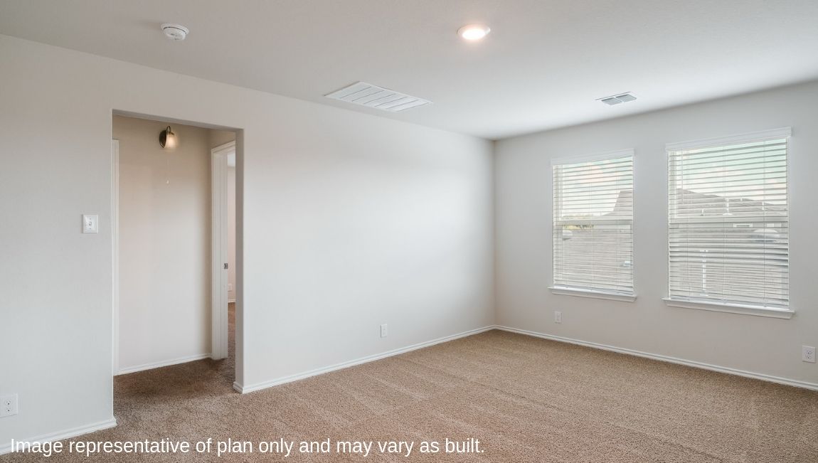 Large, versatile loft space with quality carpet and windows providing plenty of natural light.