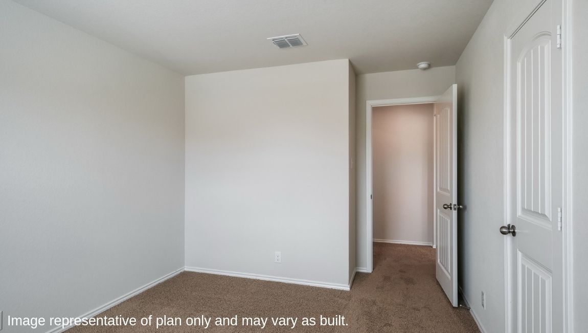 Fourth bedroom with quality carpet, window and closet.