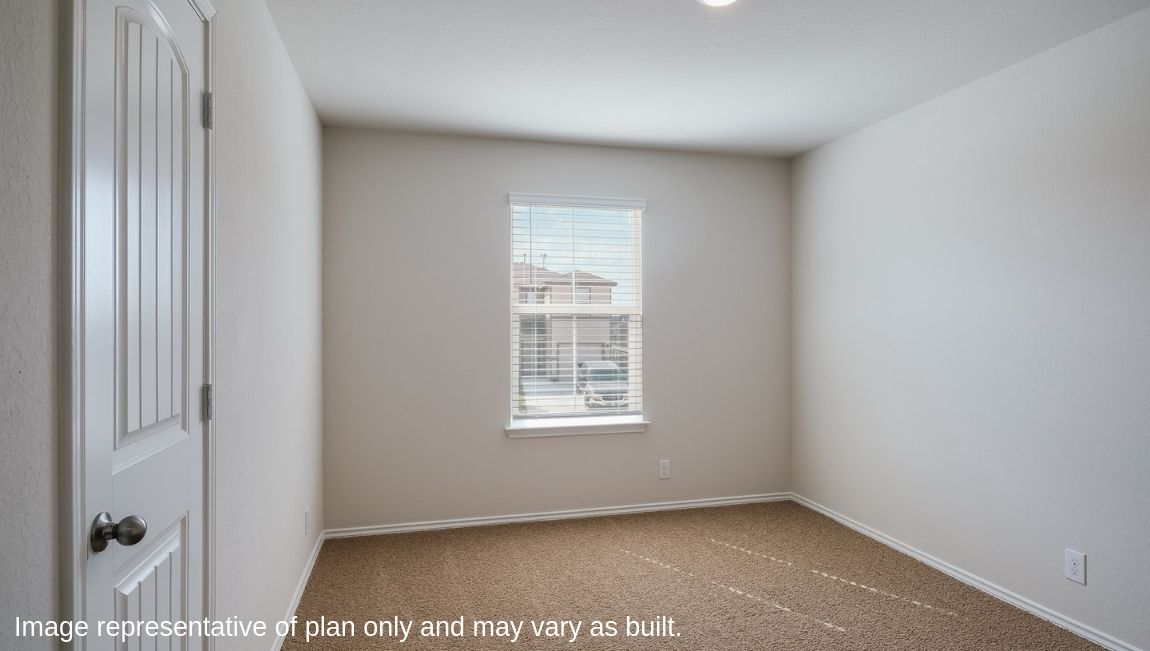 Fourth bedroom with quality carpet, window and closet.