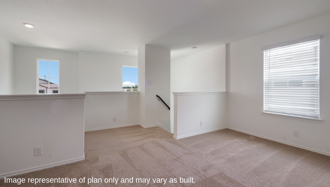Large, versatile loft space with quality carpet and windows providing plenty of natural light.