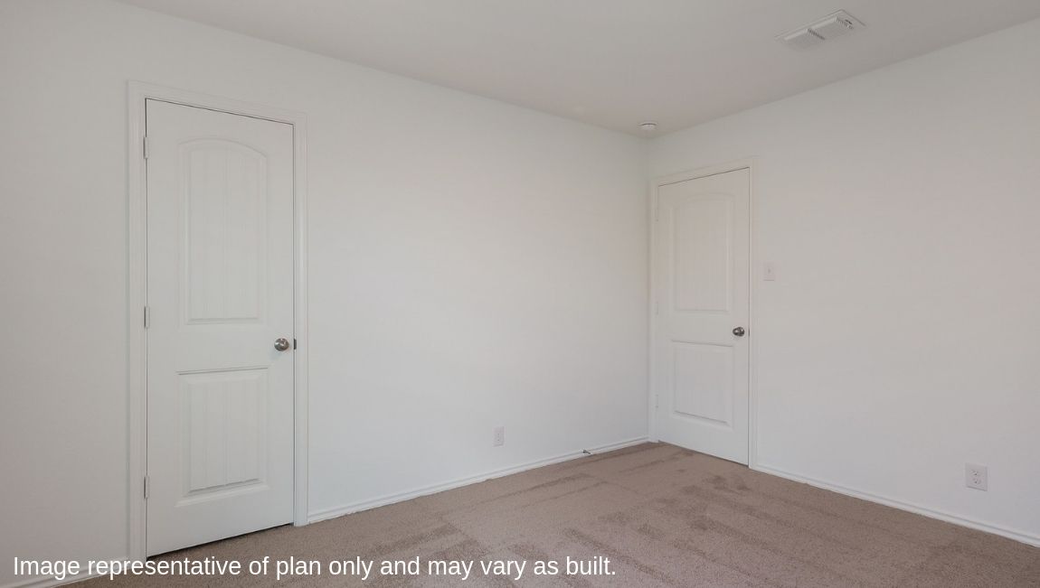 Third bedroom with quality carpet, window and closet.