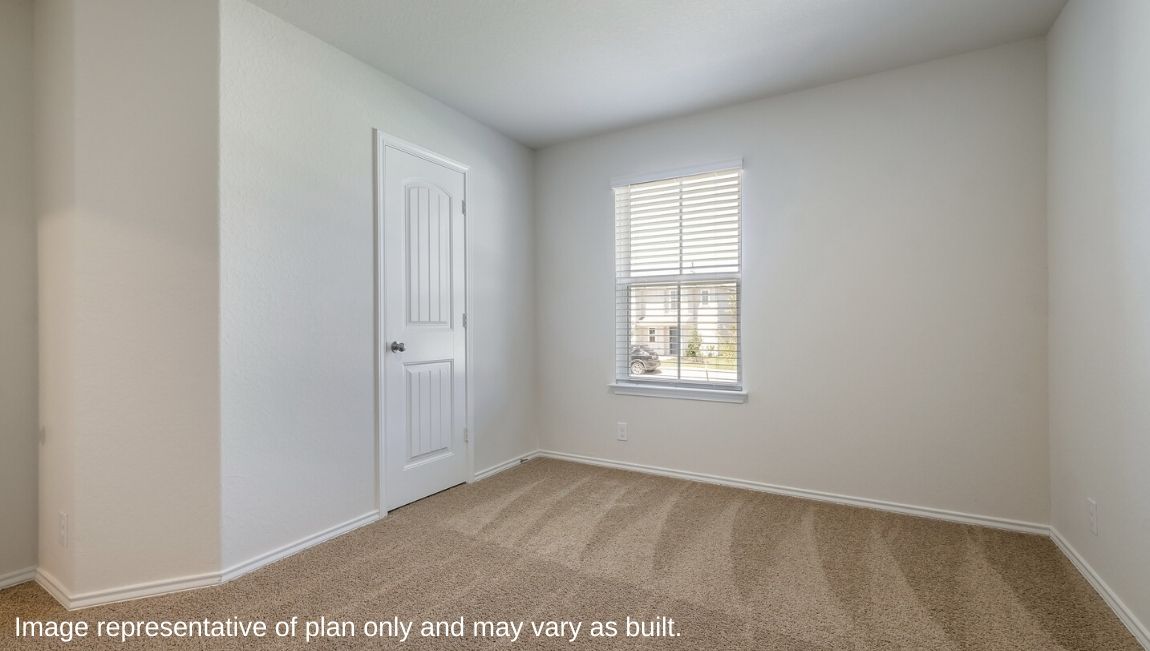 Loft with window and storage closet.
