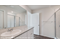 San Antonio Applewood New Construction Homes ensuite bathroom with single vanity sink walk in shower and water closet