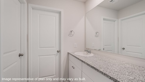 San Antonio Applewood New Construction Homes ensuite bathroom with granite single vanity water closet and walk in closet