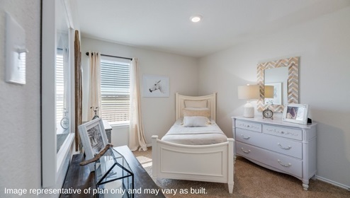 San Antonio Applewood New Construction Homes secondary bedroom with twin bed dresser and side table