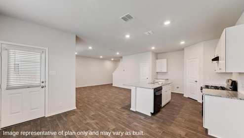 San Antonio Applewood New Construction Homes open concept dining kitchen and living area with access to backyard