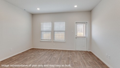 San Antonio Applewood New Construction Homes living room family room natural lights large windows plank flooring door to back porch