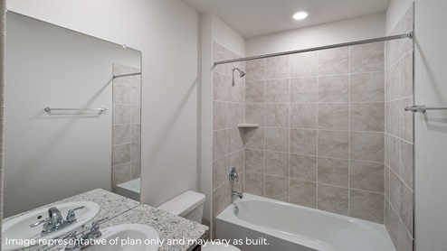 DR Horton Converse Avenida 12331 kudu pass the jasmine floor plan 2 story 2 car garage 2182 square feet secondary bathroom with single vanity sink wall mirror toilet and combined shower and tub with tile surround