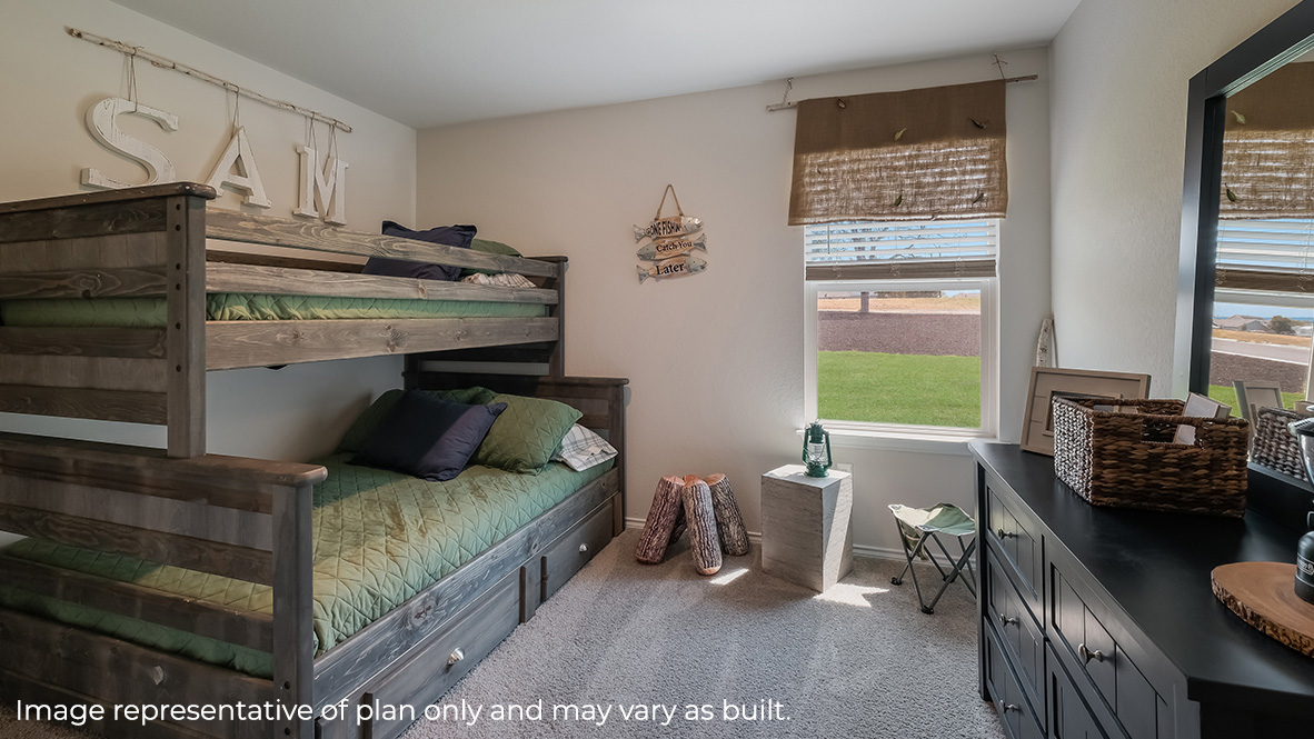 Third bedroom with quality carpet, window and closet.