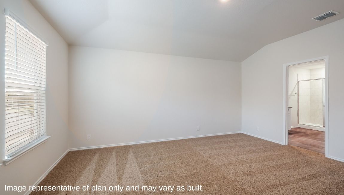 Primary bathroom with plenty of counterspace and walk-in closet.