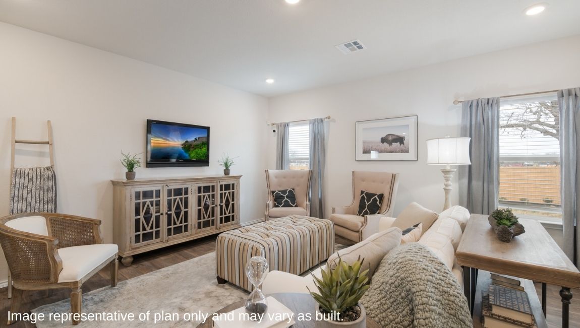 Spacious living area with overlooking kitchen.