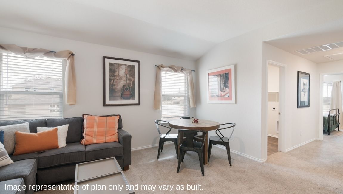 Spacious primary bedroom with quality carpet and ensuite bathroom.