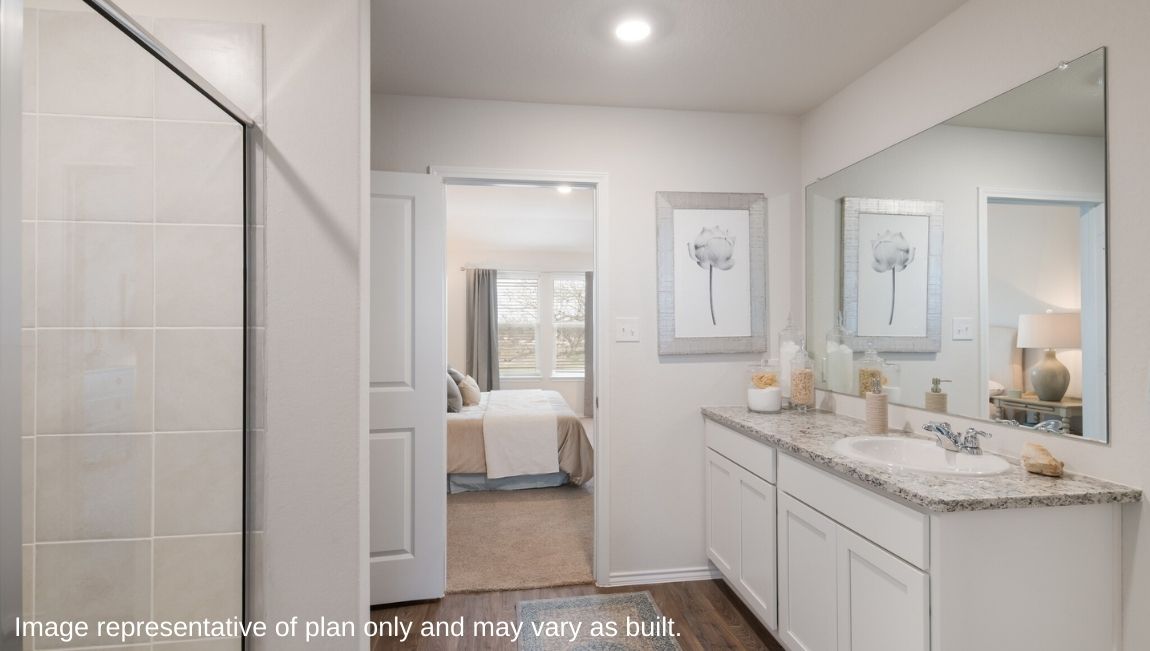 Spacious primary bedroom closet with shelving.