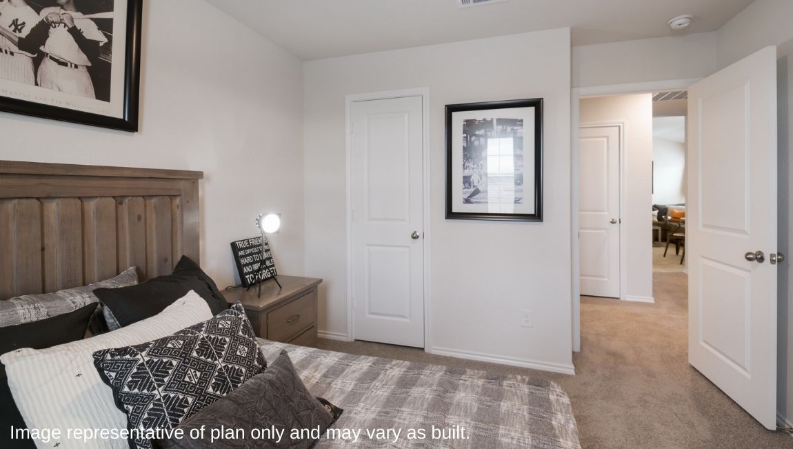 Third bedroom with quality carpet, window and closet.