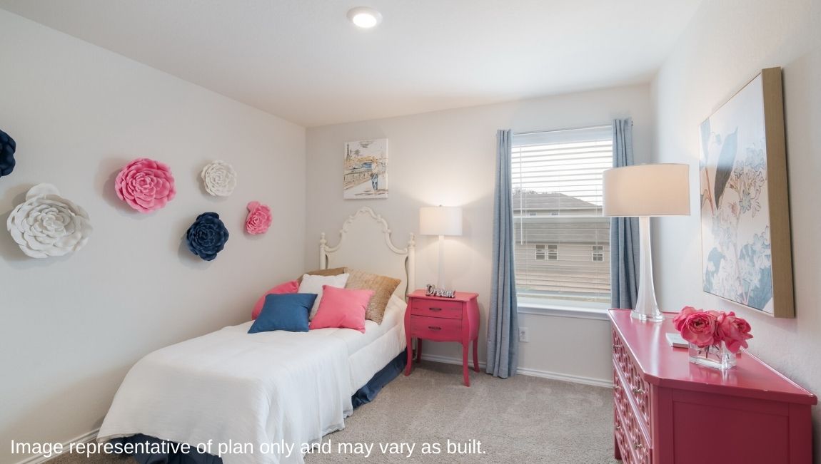 Fourth bedroom with windows and closet.