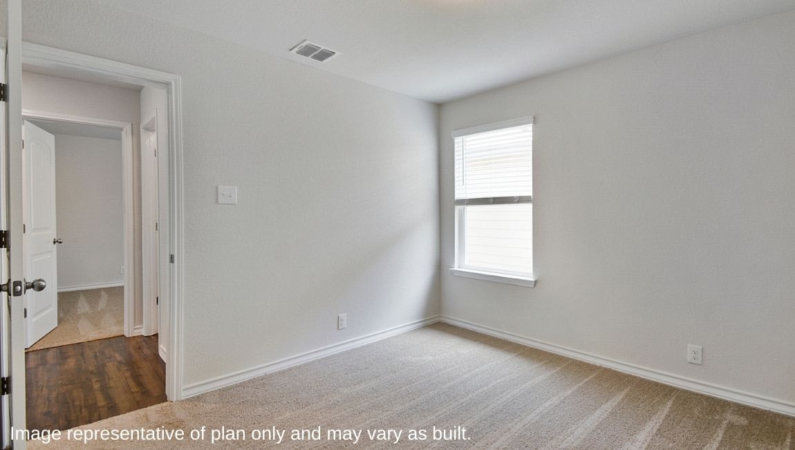 Secondary bedroom closet with shelving.