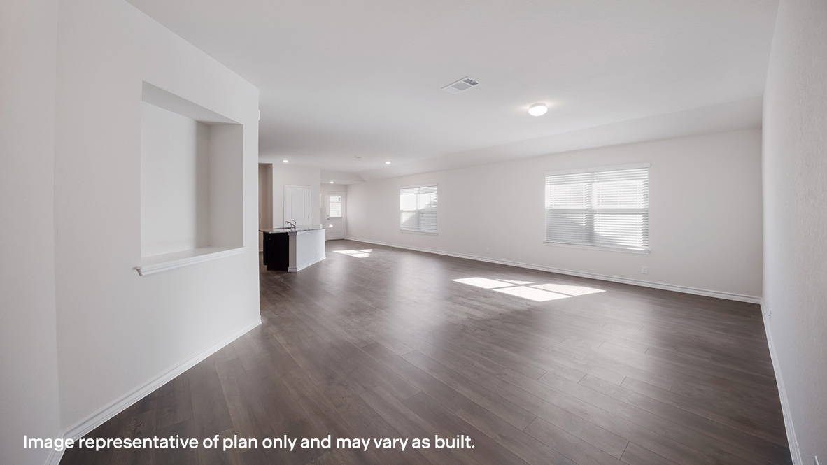 Large decorative wall nook and spacious open-concept family room and kitchen,