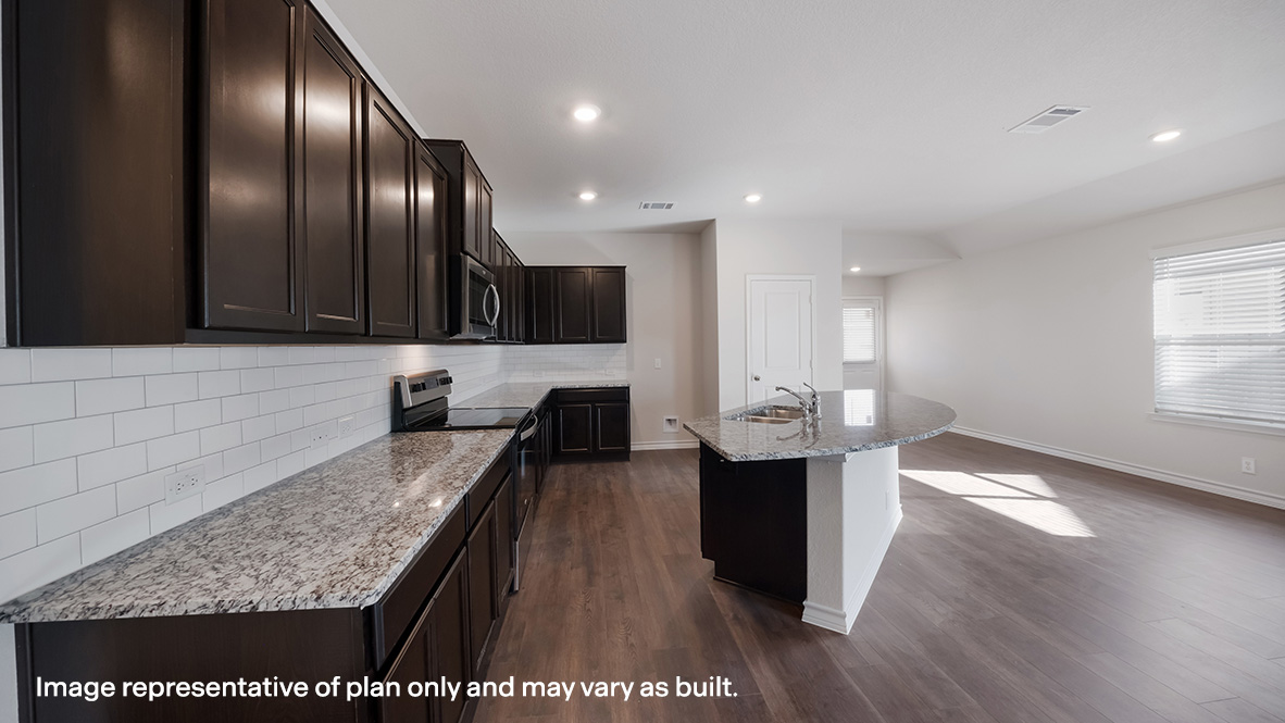 Spacious kitchen with granite countertops and plenty of counterspace.