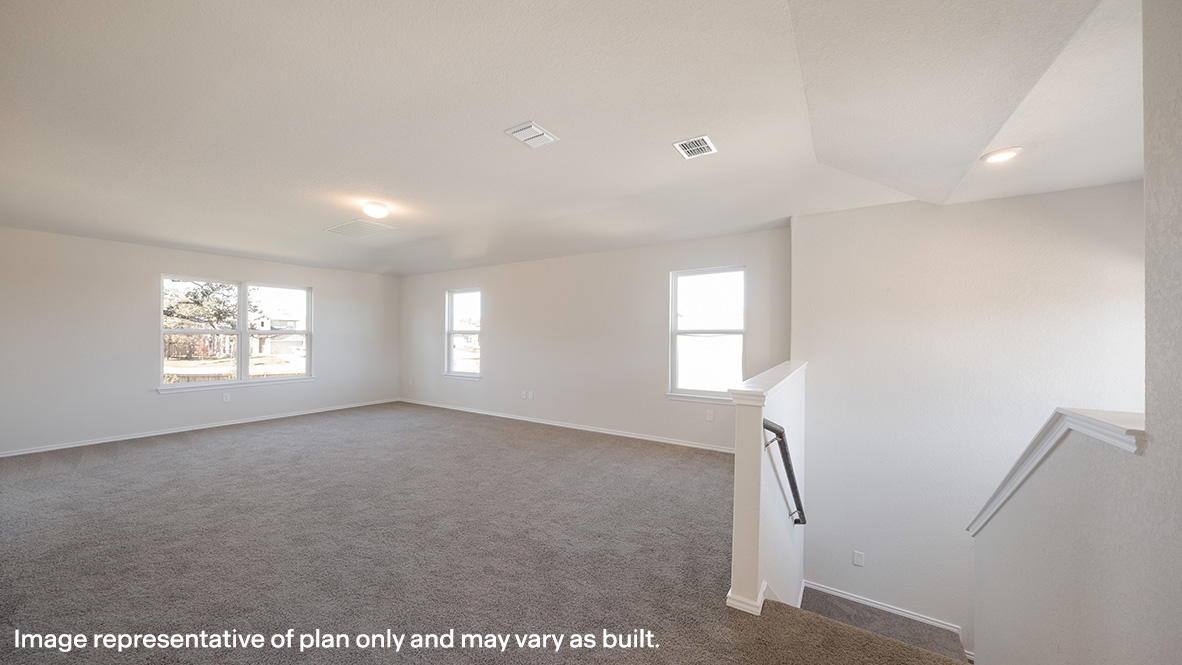 Large, versatile loft space with quality carpet and windows providing plenty of natural light.
