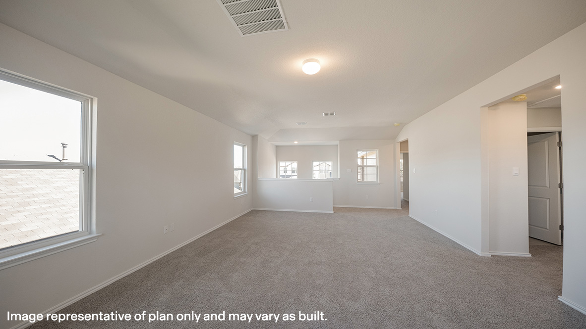 Large, versatile loft space with quality carpet and windows providing plenty of natural light.