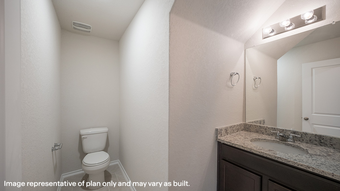 Powder bathroom with hard surface flooring.