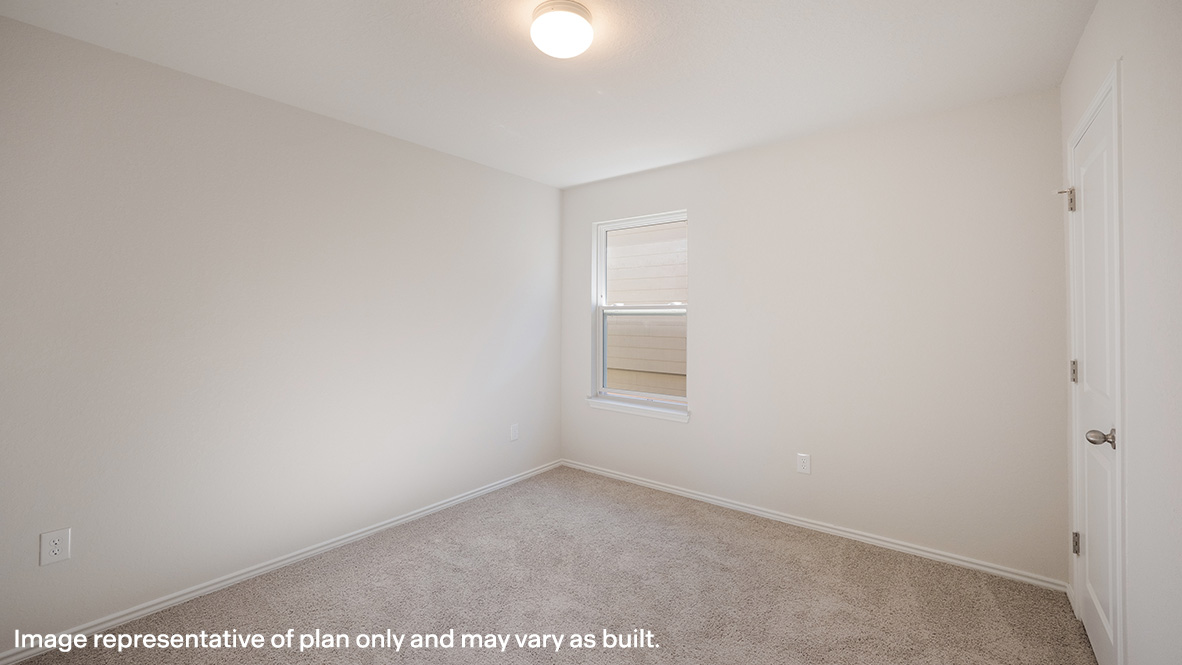 Secondary bedroom with quality carpet, window and closet.