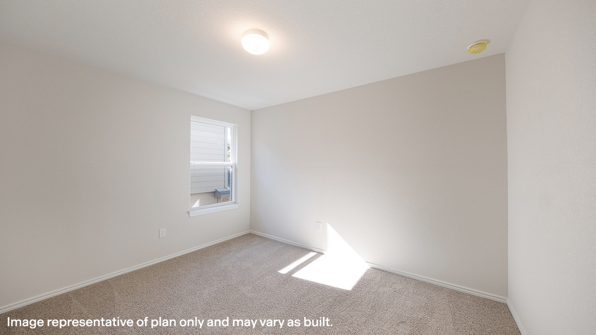 Third bedroom with quality carpet, window and closet.