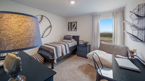 Secondary bedroom with quality carpet, window and closet.