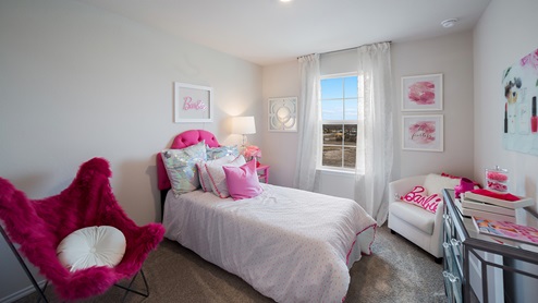 Third bedroom with quality carpet, window and closet.