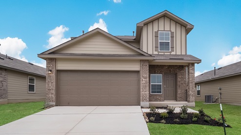 d.r. horton san antonio stonehill community two story home with two car garage and brick stone and siding front exterior