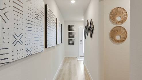 Midtown entry hallway with geometric artwork.