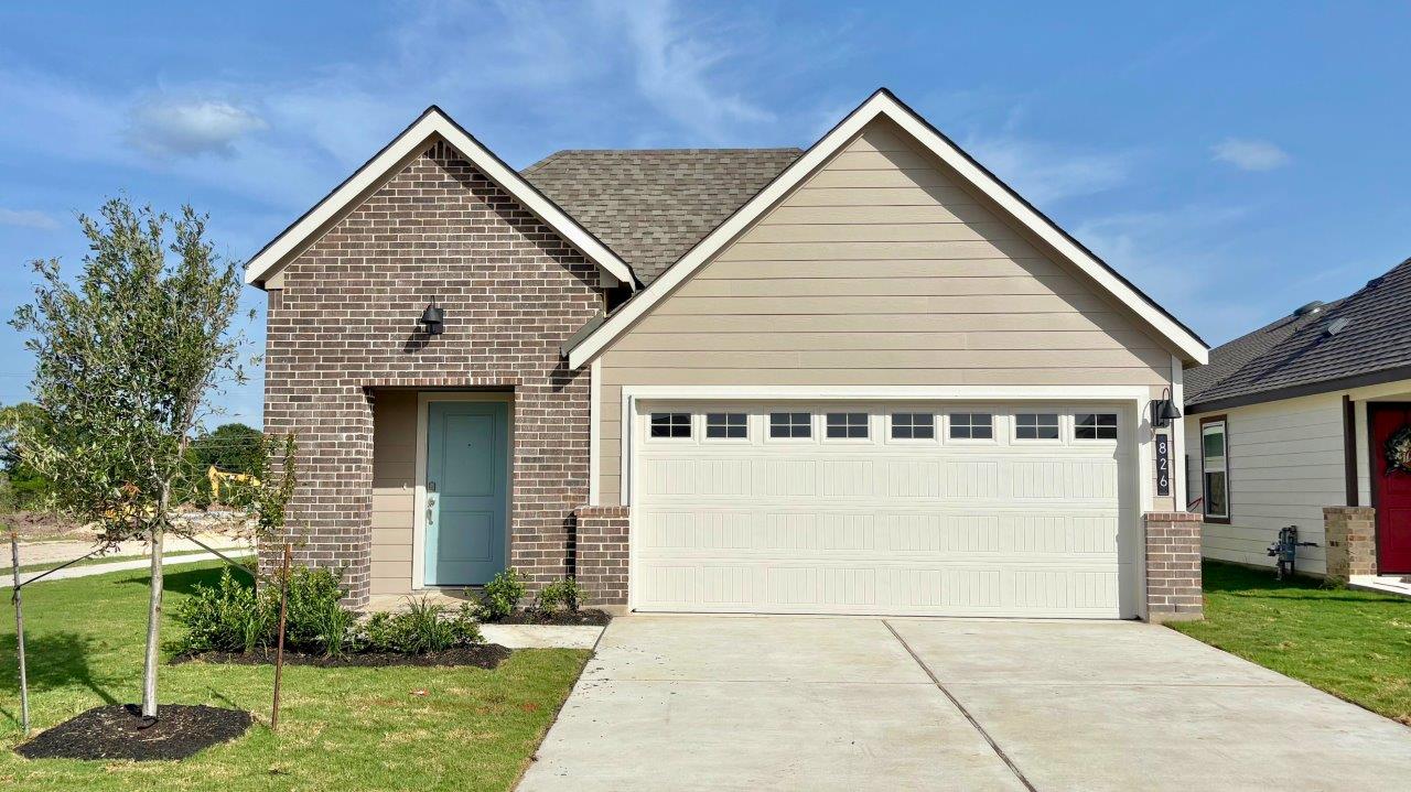 Midtown Reserve Hero Image of a one-story home with brick masonry