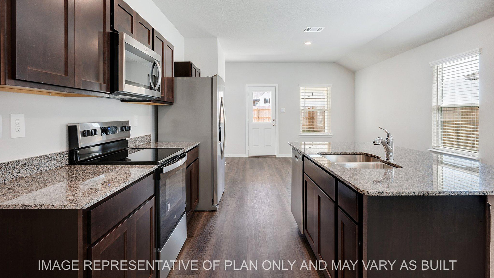 Brooke kitchen with stainless steel appliances and kitchen island.