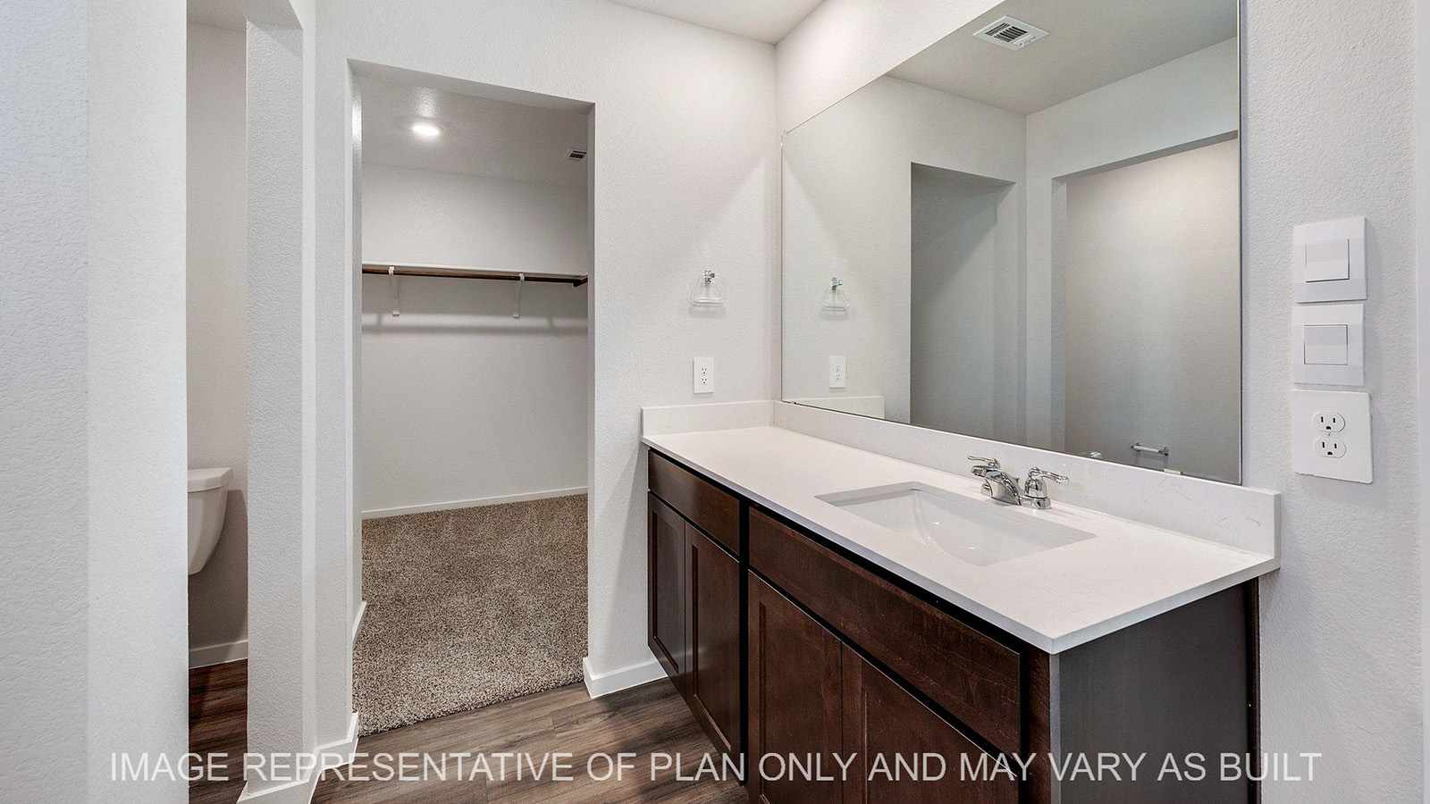 Brooke primary bathroom with walk-in closet.