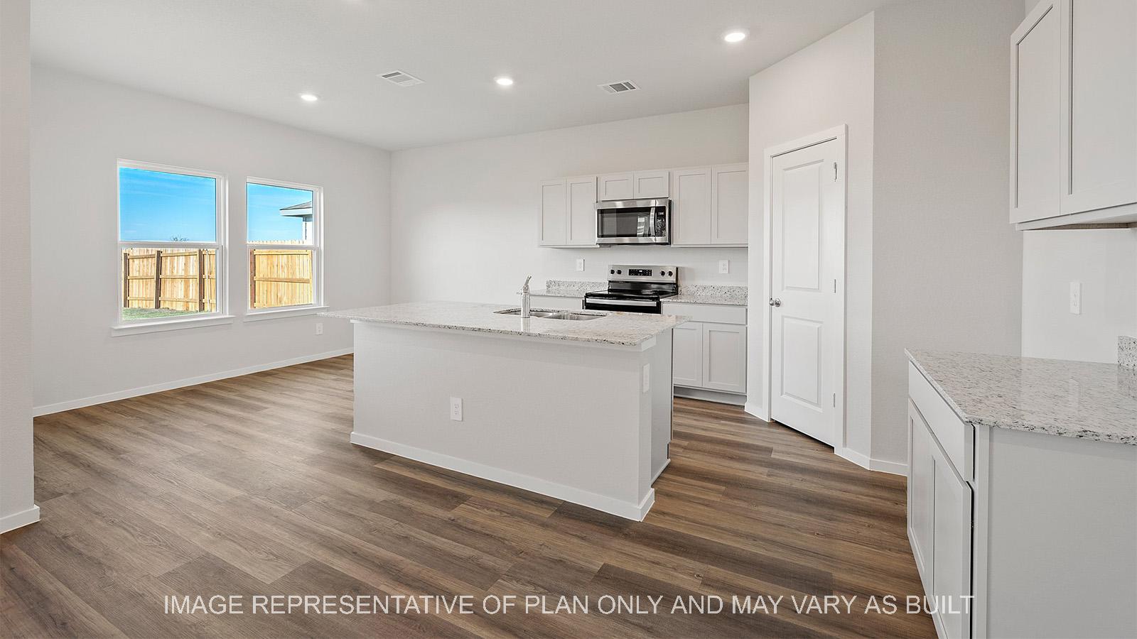 Emma kitchen with view to dining area.