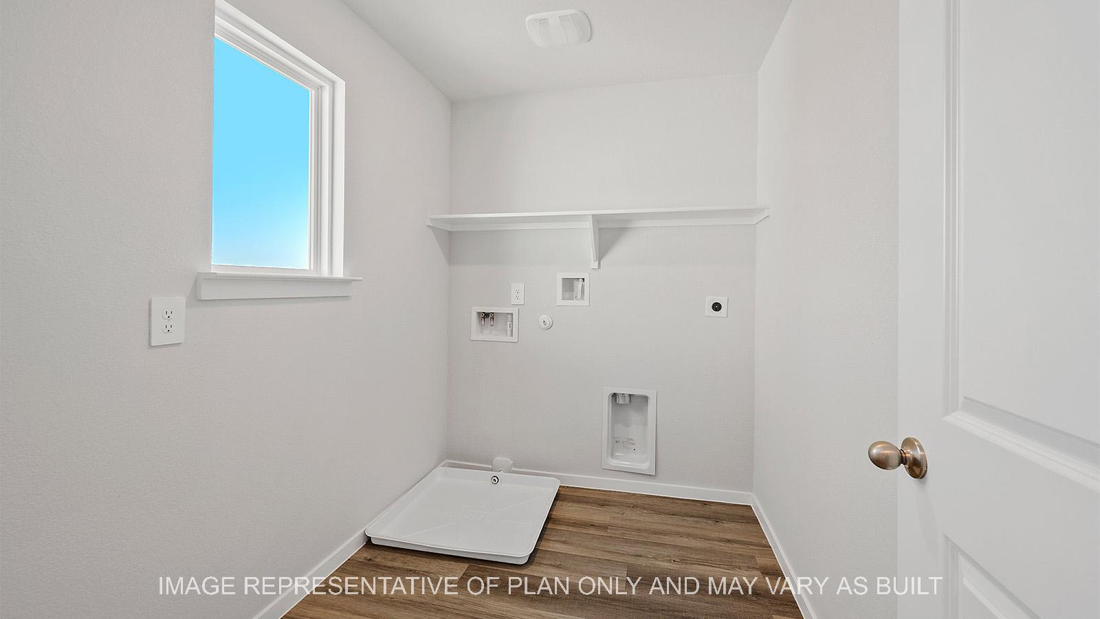 Emma utility room with window, vinyl plank flooring, and hookups.