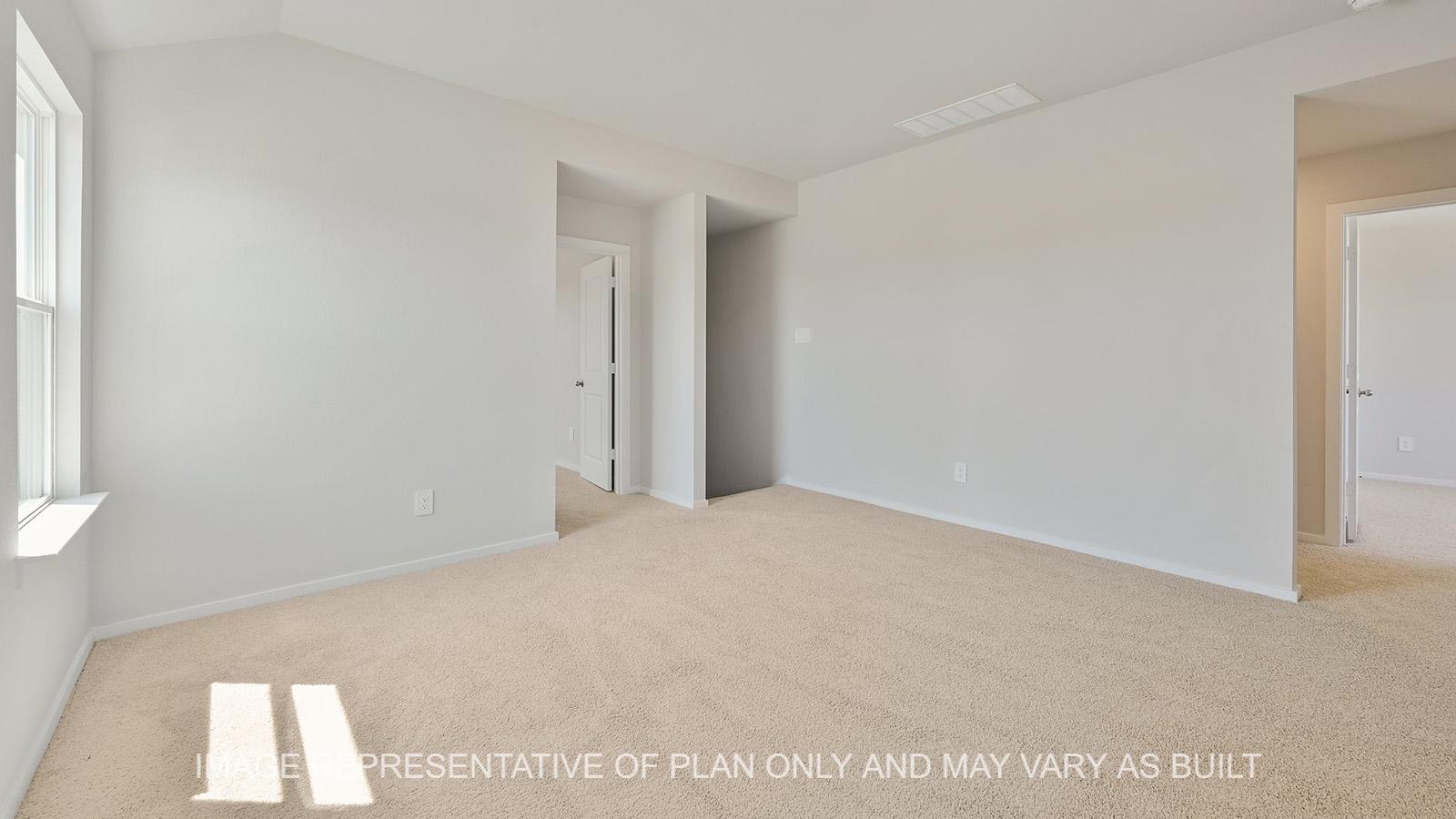 Jasmine upstairs loft with windows and carpeted flooring.