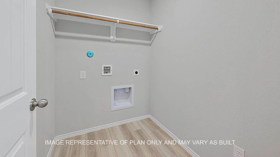 Ashburn utility room with vinyl plank flooring.