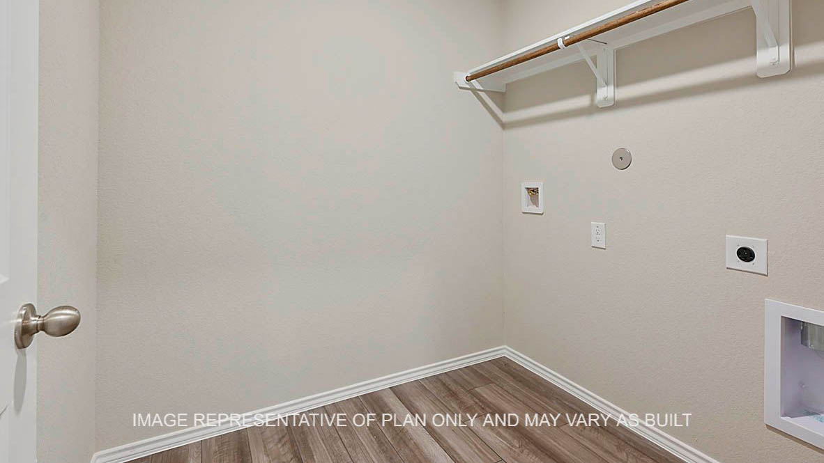 Texas Cali utility room with vinyl plank flooring.