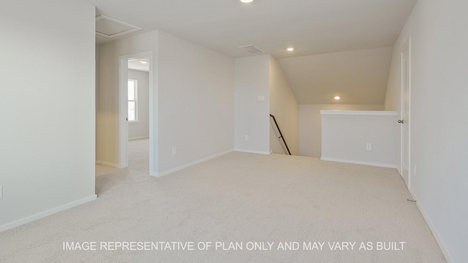 Midland upstairs loft with carpeted flooring.