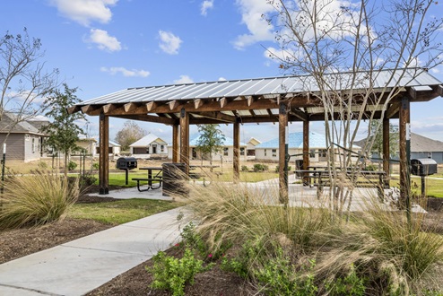Liberty Village Community Pavilion with grill and landscaping.
