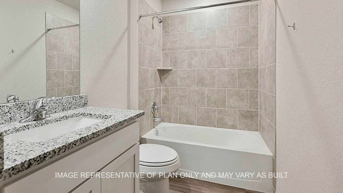 Kingston secondary bathroom with white cabinetry, granite countertops, ceramic tile shower bath surround, and vinyl plank flooring.