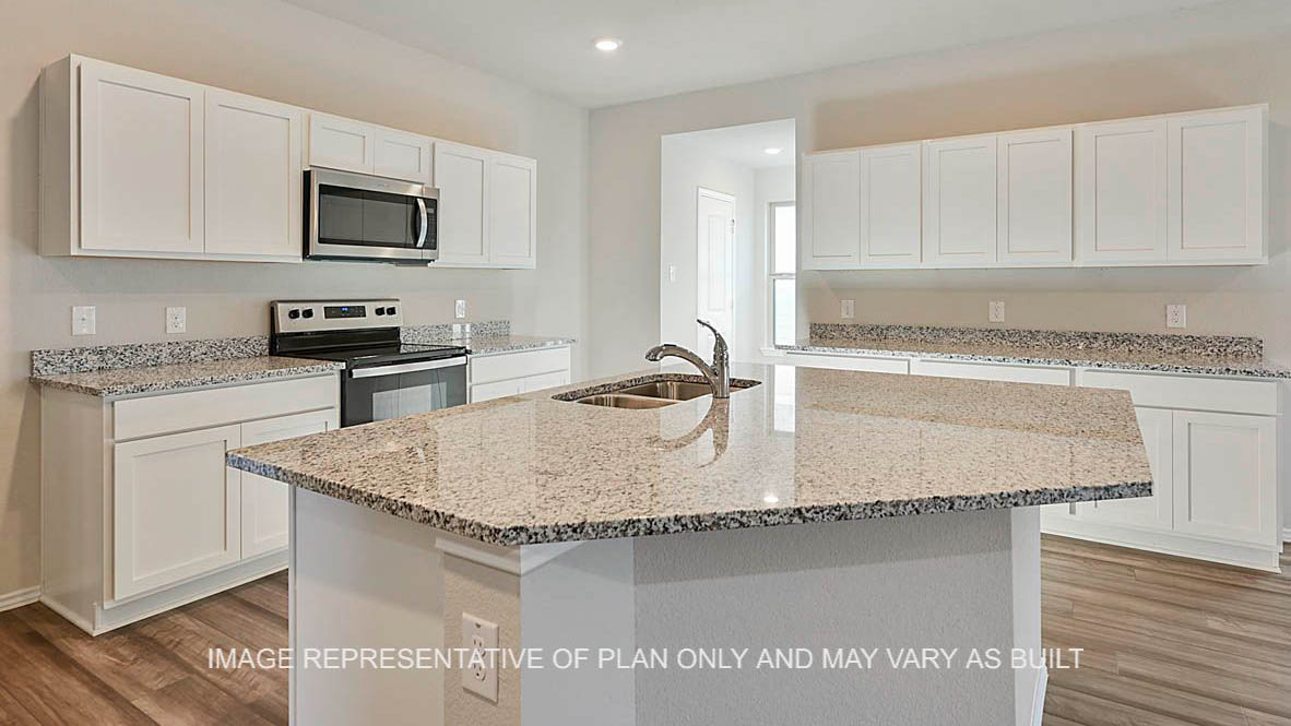 Kingston kitchen with white cabinetry, granite countertops, kitchen island and vinyl plank flooring.