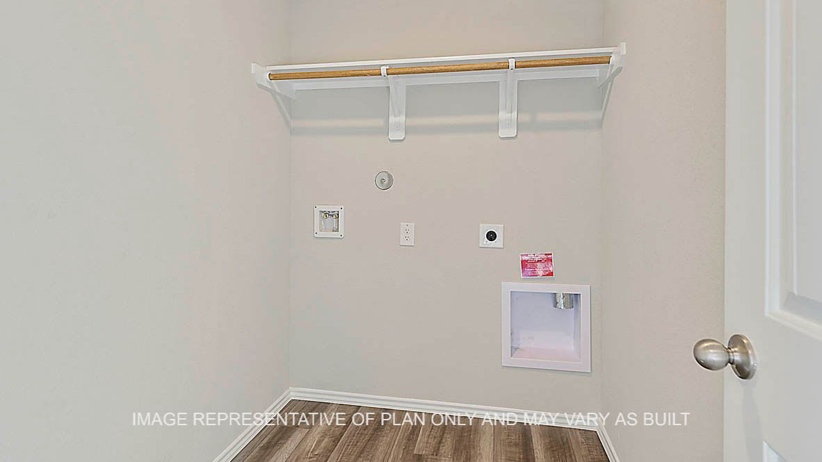Kingston utility room with vinyl plank flooring.