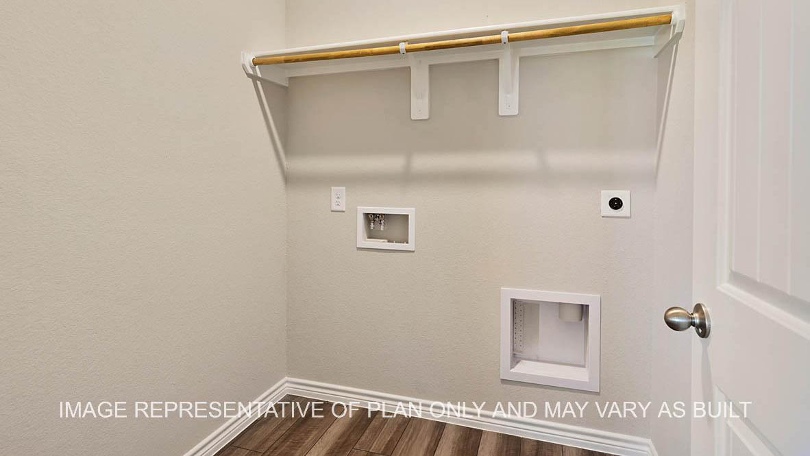 Auburn utility room with vinyl plank flooring.