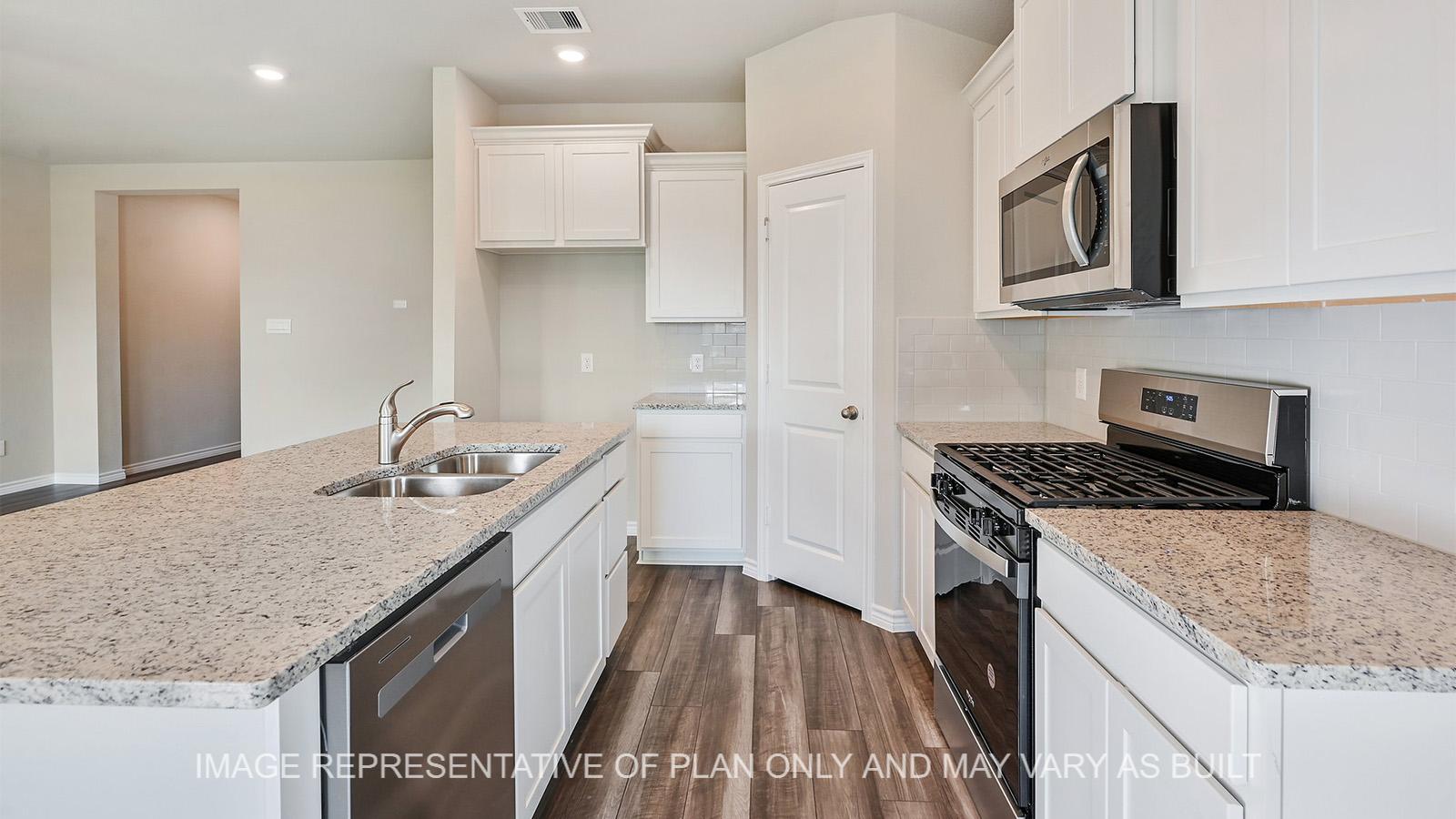 Alpine open-concept kitchen with white cabinetry, granite countertops, tile backsplash, and vinyl plank flooring.