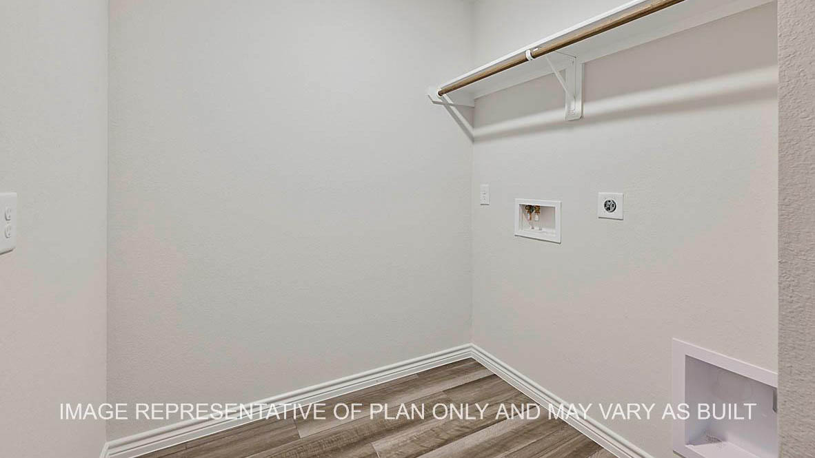 Roosevelt utility room with gray vinyl plank flooring.