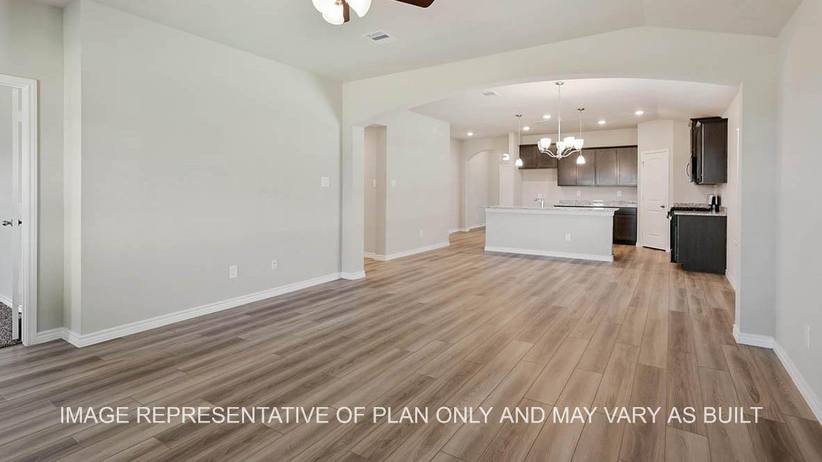 Richmond living room with view to kitchen and vinyl plank flooring.