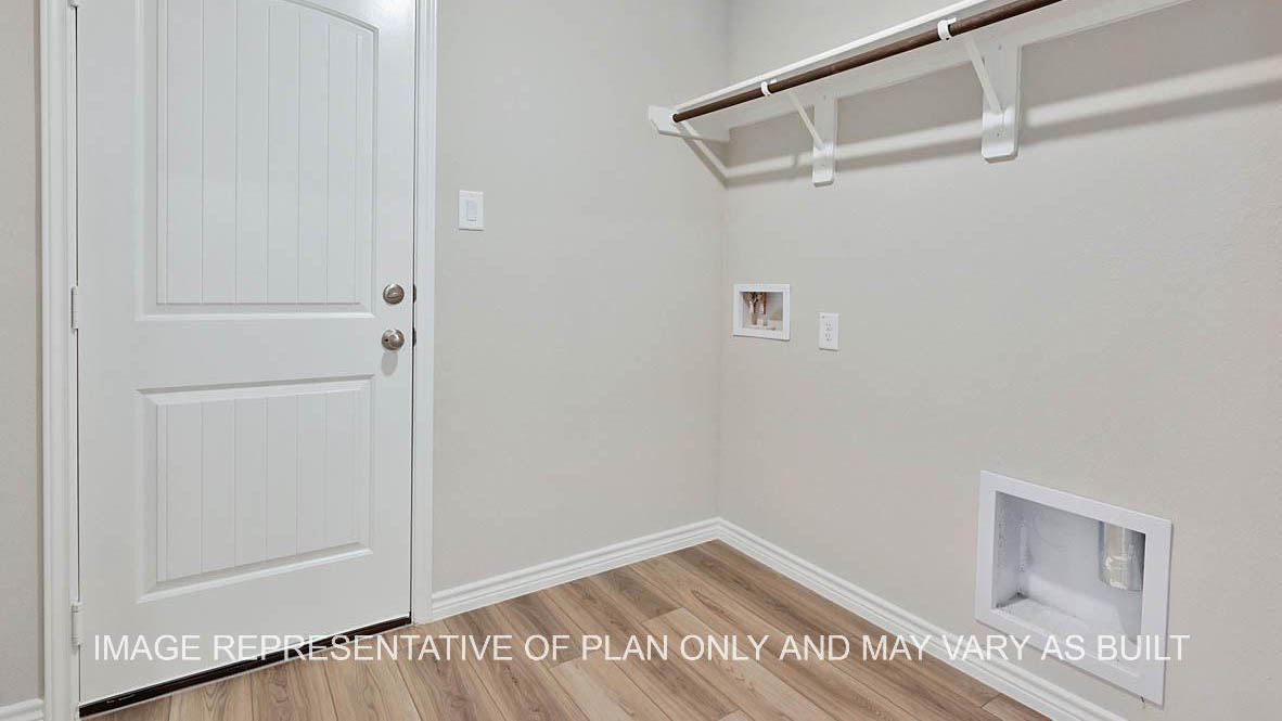 Richmond utility room with vinyl plank flooring.